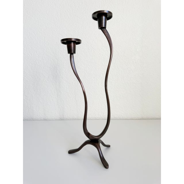 Featuring a bold, wavy design and a rich bronze finish, this Brutalist-style candlestick adds an interesting sculptural...