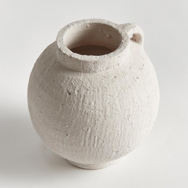Amphorainspired vessel with a modern sensibility, this vase is made to inhabit the contemporary space. Handthrown with a...