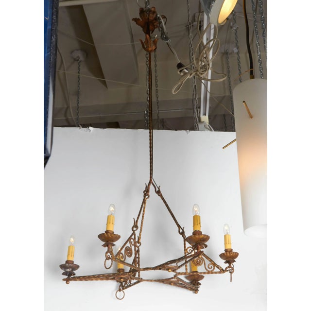 A wonderful and sculptural Italian handblown glass globe pendant light fixture, circa 1970. Made in Murano, Italy. One of...