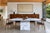 Vintage Italian Bianco Carrara marble dining table crafted in Italy during the 1970s. Defined by its sculptural pedestal...