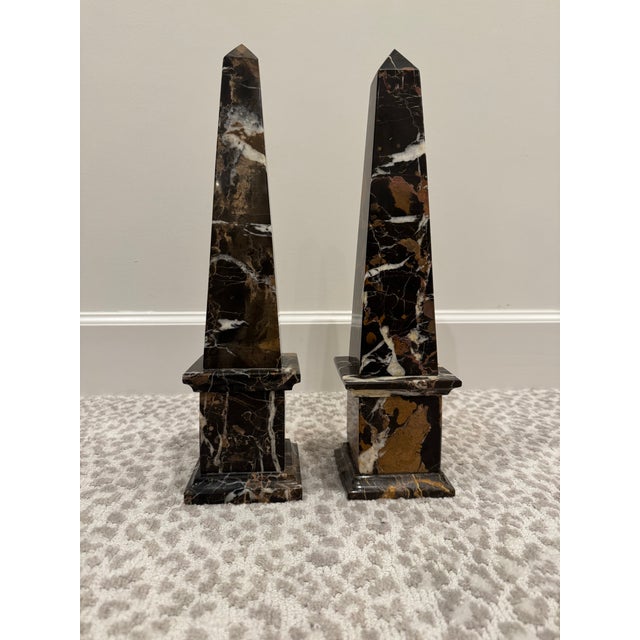 Substantial pair of 20th Century solid Italian marble obelisks weighing 10 lbs each. Striking veining and elegant cove...