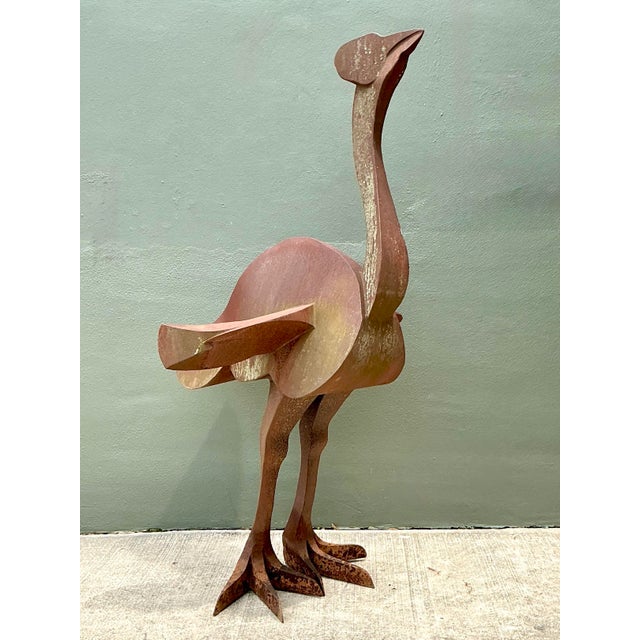 A monumental achievement in modernist metalwork, this commanding vintage ostrich sculpture stands over 5 feet tall,...