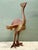 A monumental achievement in modernist metalwork, this commanding vintage ostrich sculpture stands over 5 feet tall,...