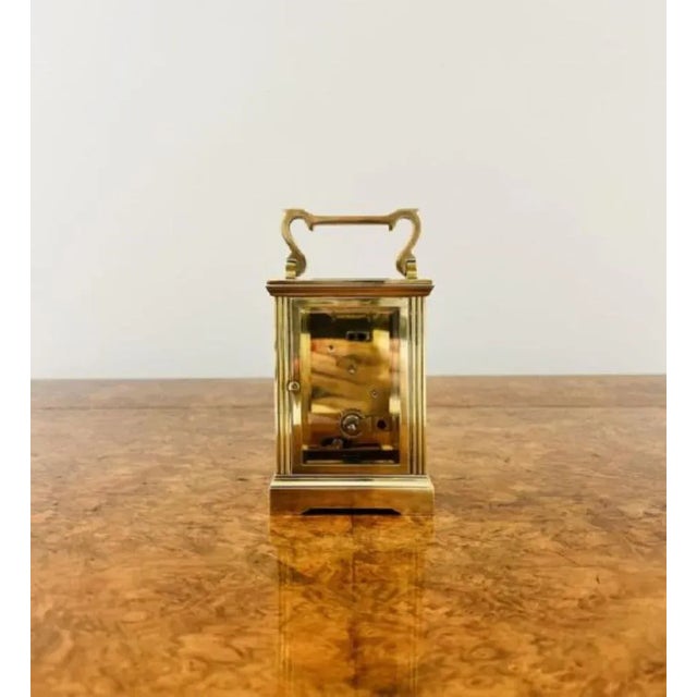 Antique Victorian quality brass carriage clock having a quality brass carriage clock with an eight day French movement,...