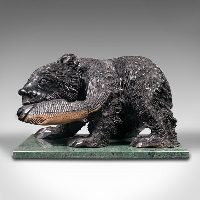 This is an antique decorative bear figure. A Japanese, carved cedar Kibori Kuma, dating to the early 20th century, circa...