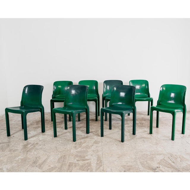 Wonderful dining set, consisting of eight Selene model chairs designed by Vico Magistretti for Artemide in 1969. The...