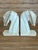 Bring sculptural elegance to your shelves with this vintage pair of carved onyx horse head bookends, crafted from...