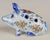 A French faience whimsical pique-fleur bud vase in the form of a seated pig. Hand-painted with floral motif in typical...
