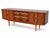 A superb 1960s Stonehill “Colony” teak sideboard, fully restored and showcasing some of the most distinctive sculptural...
