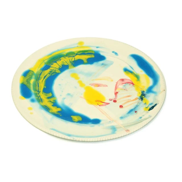 Face is a colorful hand-made flat ceramic dish hand-painted and realized by the artist, anastasia kurakina in 2019. On the...