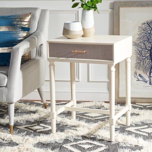 Classic elegance gets a fresh new look in this Estella Accent Table. The traditionally inspired carved details on...