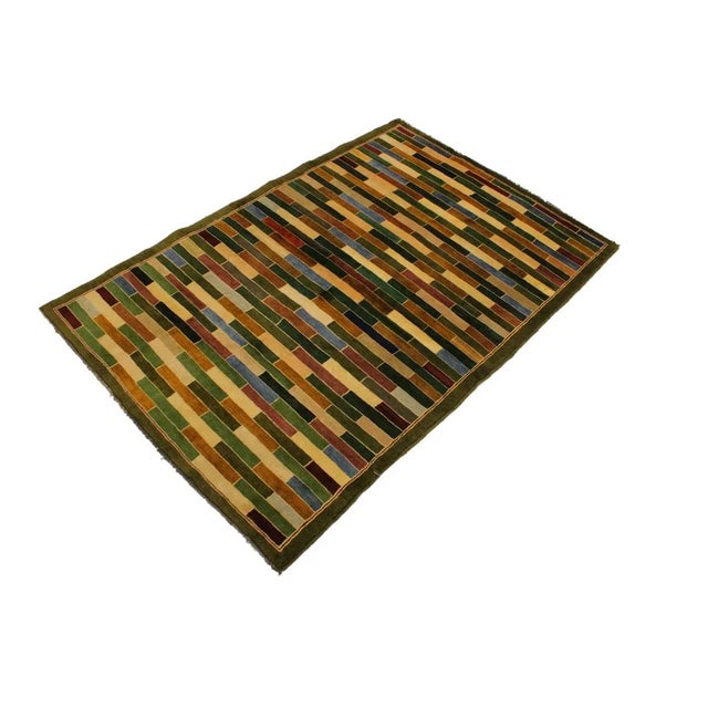 With strict standards of craftsmanship and quality of materials used this modern inspired hand knotted Gabbeh rug is a...
