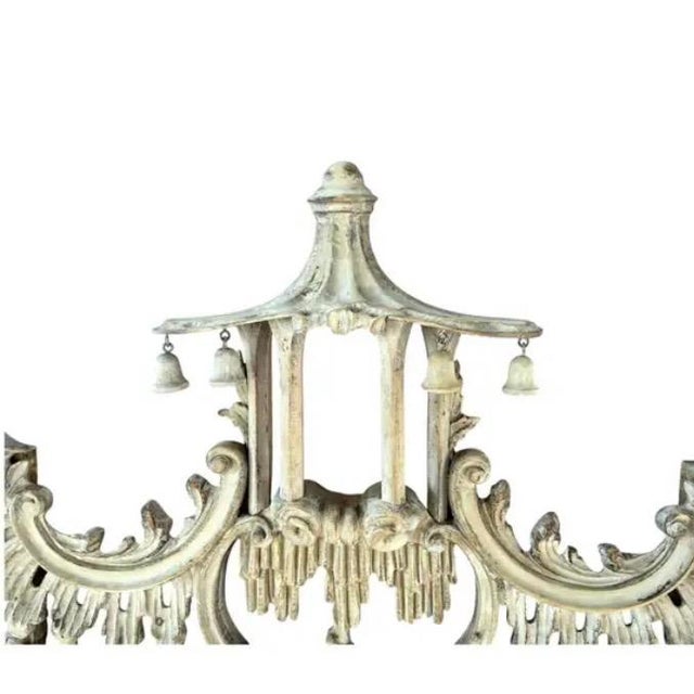 Chinese Chippendale Style Mirror in a distressed whitewash finish. Mirror is hand-carved with elaborate openwork scrolls,...