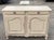 This French farmhouse buffet is made of solid cherrywood and features 2 bottom doors with raised panels and 2 top drawers....