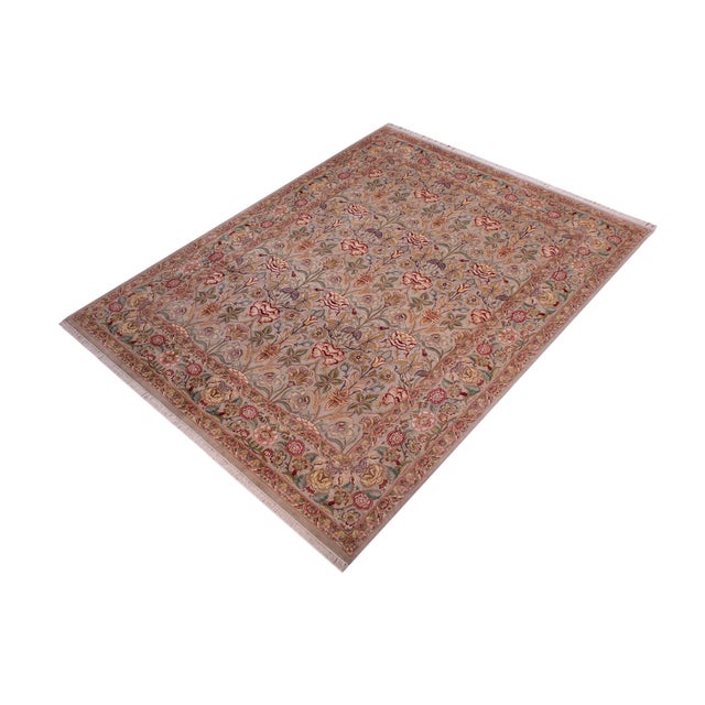 Designed with mesmerizing intricacy and gorgeous color palette, this hand-knotted masterpiece demonstrates the beauty and...