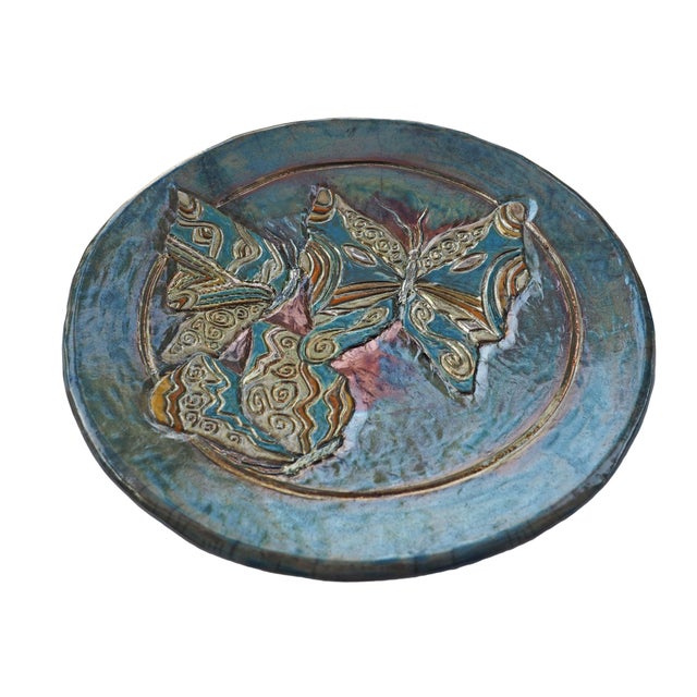 Armonie di Ali is a unique Raku ceramic work, available as a freestanding sculpture or wall-mounted. Three butterflies...