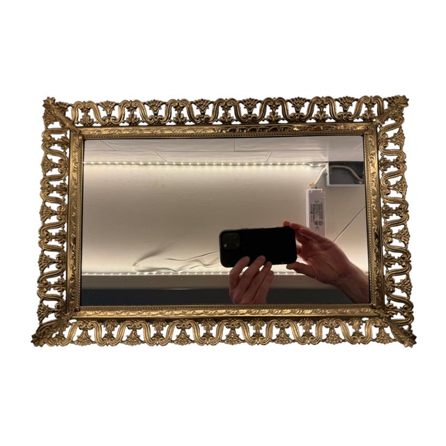 Floral Gold Gilt Mirrored Vanity Tray This beautiful tray has a rectangular center mirror surrounded by a picture frame...