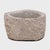 This stone basin was carved by hand nearly two centuries ago, sculpted from solid limestone to an unusual horseshoe shape....