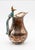 Up for sale is a stunning, authentic mid-century modern mixed-metal pitcher handcrafted by the world-renowned Los Castillo...