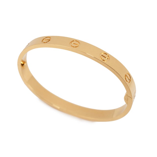 Brand: Cartier Gender: Ladies Metal Type: 18K Yellow Gold Length: 6.00 inches Width: 6.08 mm Weight: 30.00 grams CARTIER...
