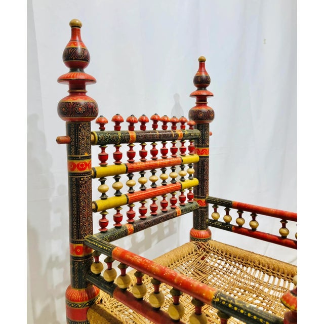 Stunning Vintage Painted Wooden Tribal Chair with Woven Seat. Original finish fittings and frame. Sure to add interest to...