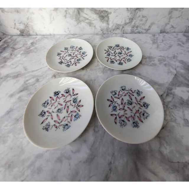 Here is a darling vintage set of four miniature 3.75" butter pats featuring a spring and summer floral design on white...