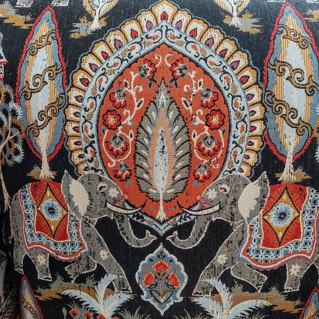 We found this Indian tapestry fabric with a wonderful shade of blue that paired beautifully with our blue Scalamandre...