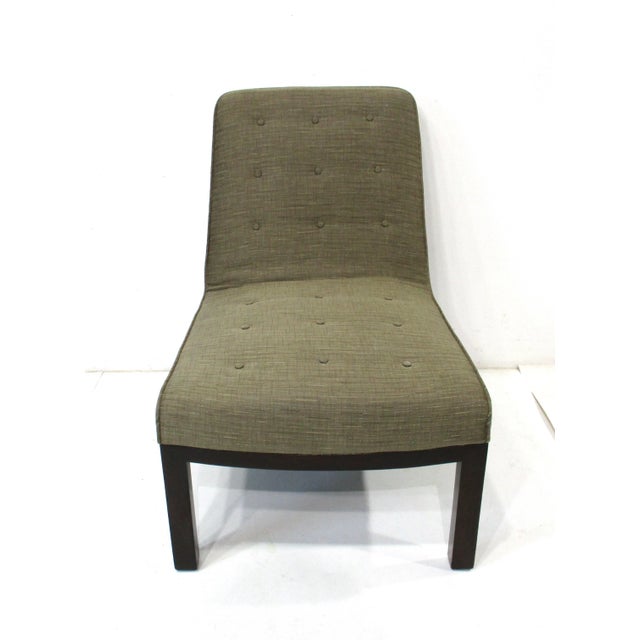 A well proportional sized upholstered Mid Century upholstered slipper chair with matching lumbar back pillow making for...