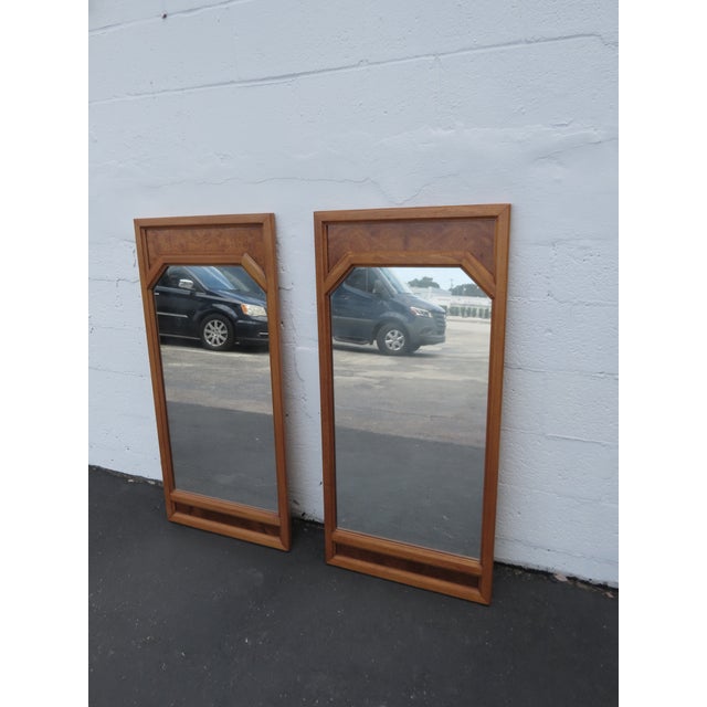 This gorgeous Pair of Mirrors is made out of wood, burlwood, veneer, and mirror. The Mirrors were made by Basic Witz, they...