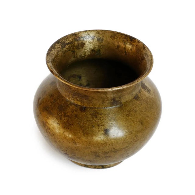 A beautifully aged Nepali bronze vessel inspired by the traditional kalasha form, historically associated with water,...