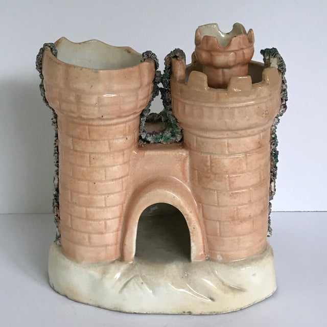 I have a collection of three of these wonderful castles for sale on Chairish. This particular castle is very unique with...