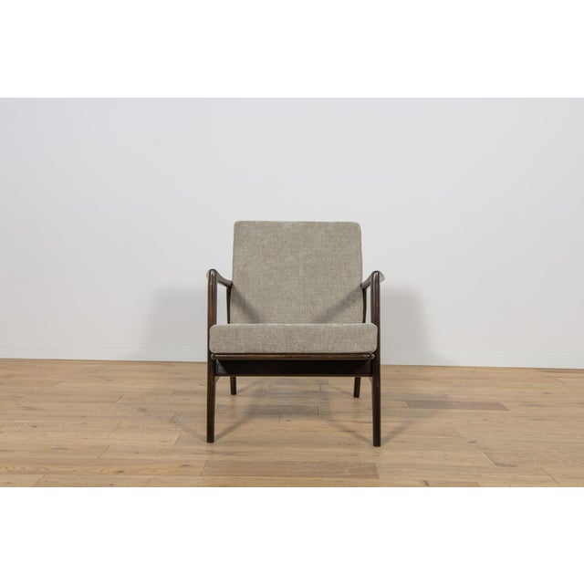 The armchair was produced by the Polish company Swarzędzka Furniture Factory in 60 s. The armchair have new cushions,...