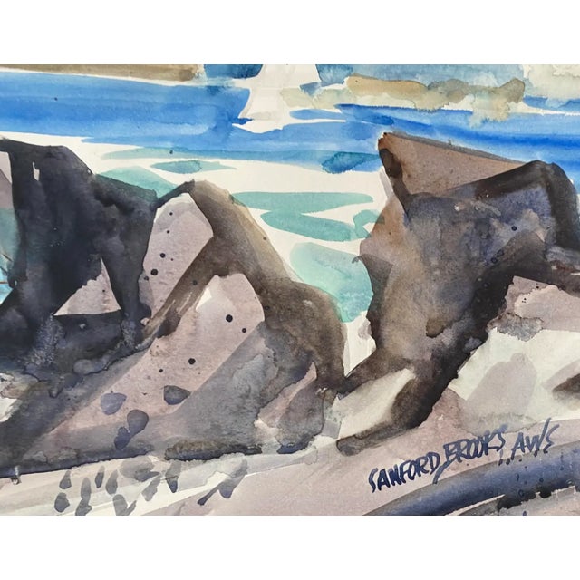 Watercolor on a topical coast with sailboats, palm trees and rocks by artist Sanford Mitchel "Samp" Brooks (1915-1999)....