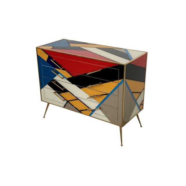 Dresser with four drawers, entirely handmade, with wooden structure and multicolor Murano glass surface finishes;...