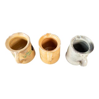 French 19th Century Terracotta Pottery Pitchers With Floral Décor For Sale