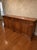 Beautiful antique pine credenza/buffet. This very large piece features four drawers with spacious cabinets beneath for...
