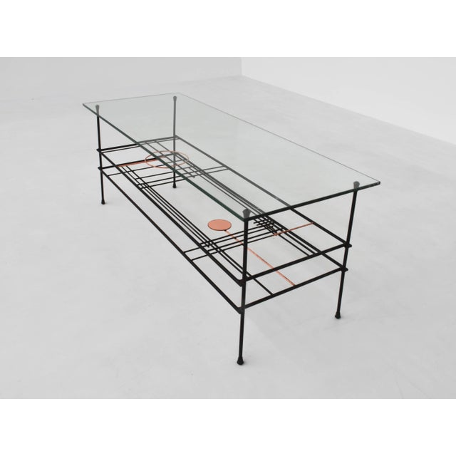 Coffee Table with Triple Support in Metal by Ferrabini, in Good conditions. Designed 1960 to 1969 This piece is attributed...