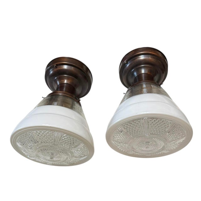 This pair of ceiling lights will look fabulous in a kitchen or down a hallway. The industrial look pairs well with Mid-...