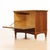 A beautifully engineered British liquor cabinet dating from the 1950s, featuring an ingenious mechanical opening action...