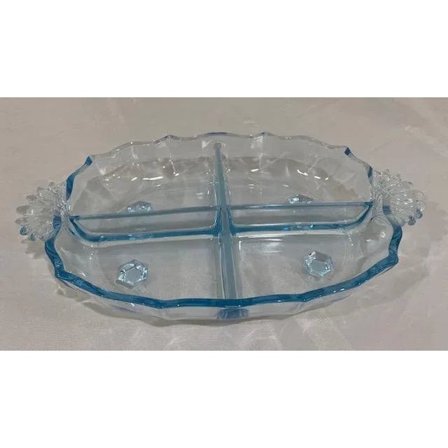 We love the shade of blue of this vintage 1930'3 Fostoria Baroque Blue 4 part relish dish. A nut dish, a candy dish, or a...
