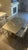 Beautiful, high-quality silver counter-height dining set by Metall Furniture. Clean modern/industrial boat shape design...