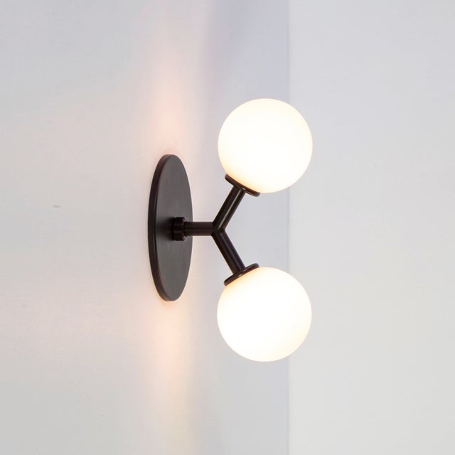 Maybe you burn the candle at both ends? The Y Sconce blends modern and minimal. This balanced fixture adds a carefully...