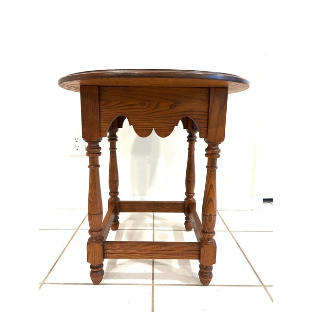 Own a piece of American furniture history. This beautiful oval tavern-style table is an authentic piece by the world-...