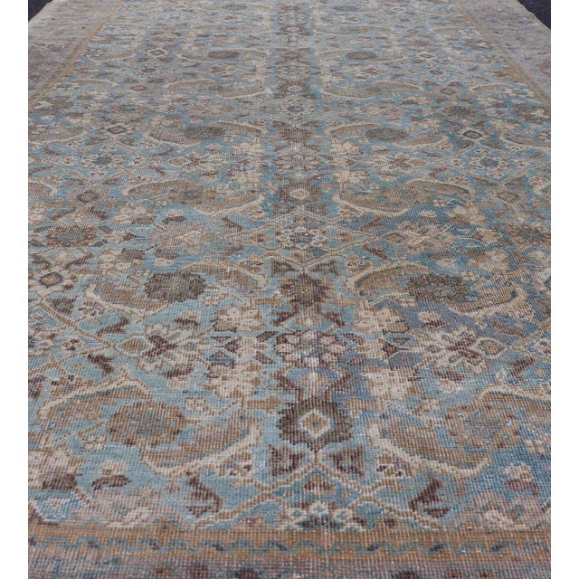 Antique Persian Sultanabad In Floral All-Over Design in Light Blue With Tan. Country of Origin: Iran; Type: Mahal; Design:...