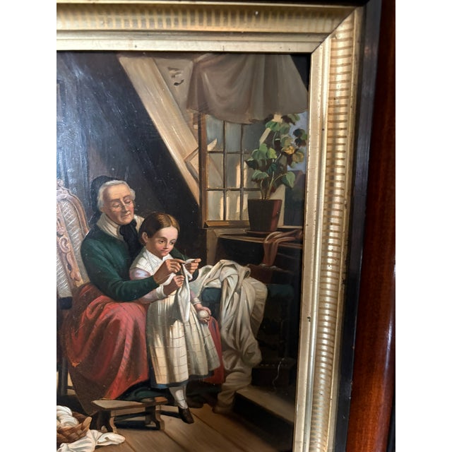 Framed Oil on Board Depicting "Woman Teaching Granddaughter to Saw", Mid-20th Century