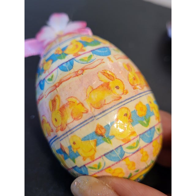 Paper mache eggs have a long tradition in German Easter culture. This lot of 5 are decoupaged with bright spring colors...