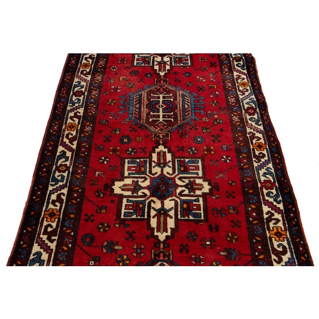 Textile Vintage Heriz Red Handmade Wool Rug With Tribal Motif For Sale - Image 7 of 8