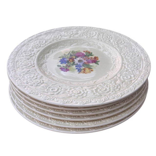 This is an elegant set of six vintage ceramic dinner plates produced by the historic British pottery manufacturer, Crown...
