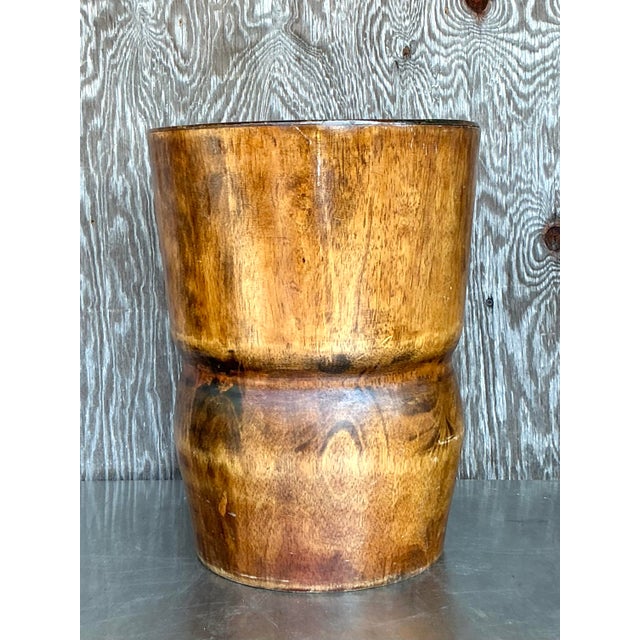 Sculptural and striking, this vintage boho low stool is a true conversation piece, hand-carved from solid wood with a...