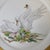 This decorative charger plate was produced by Edward Marshall Boehm in 1972 as part of the Bird of Peace series, featuring...